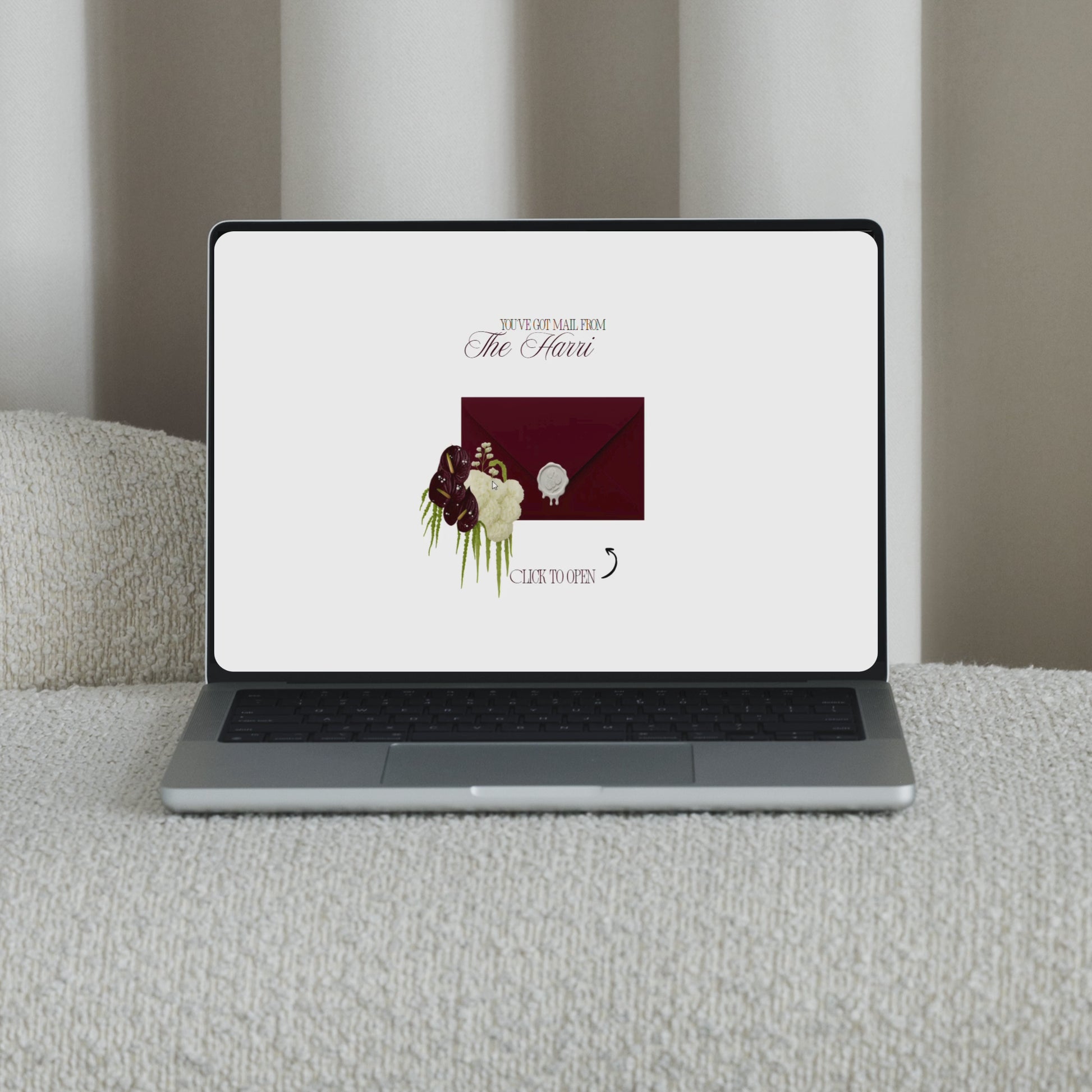Interactive video showing a luxury burgundy wedding envelope opening animation to reveal a save the date website.